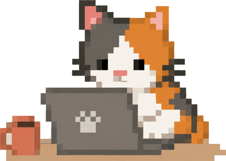 Lily the calico cat editing at her laptop